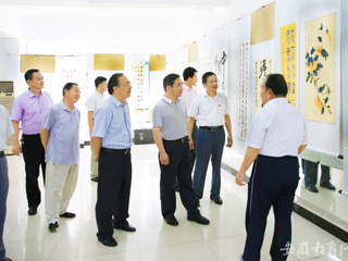 【安博在线(中国)唯一官方网站】淮北师大举行庆祝中国共产党成立95周年暨红军长征胜利80周年书画展