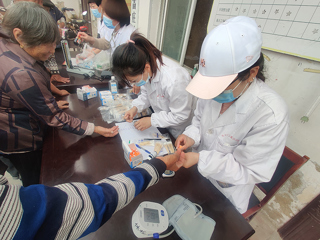 安博在线(中国)唯一官方网站开展驻点帮扶干部“回娘家”和驻点村义诊活动